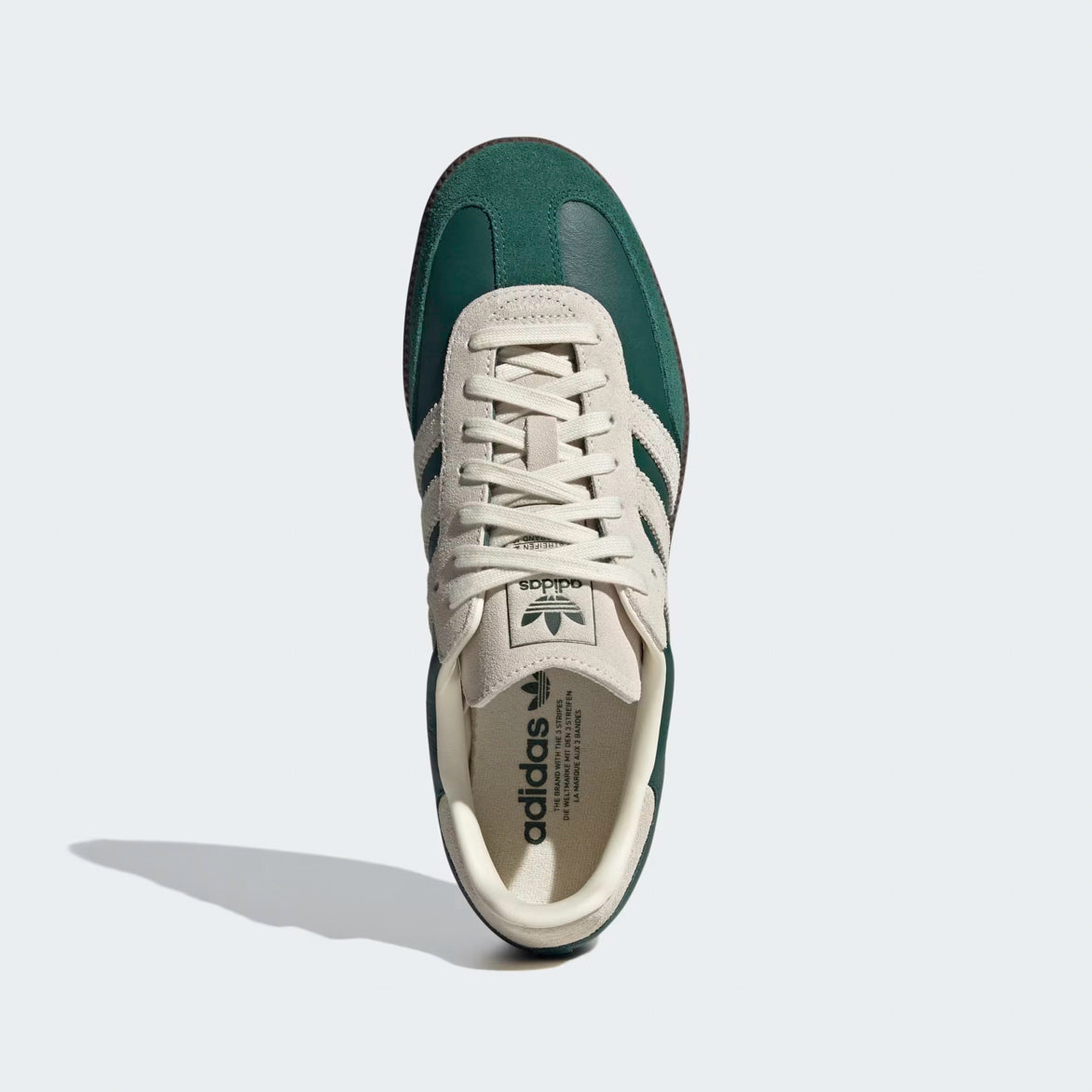 Adidas Samba OG Sneakers in action on the street, styled with casual attire for a trendy, urban look.