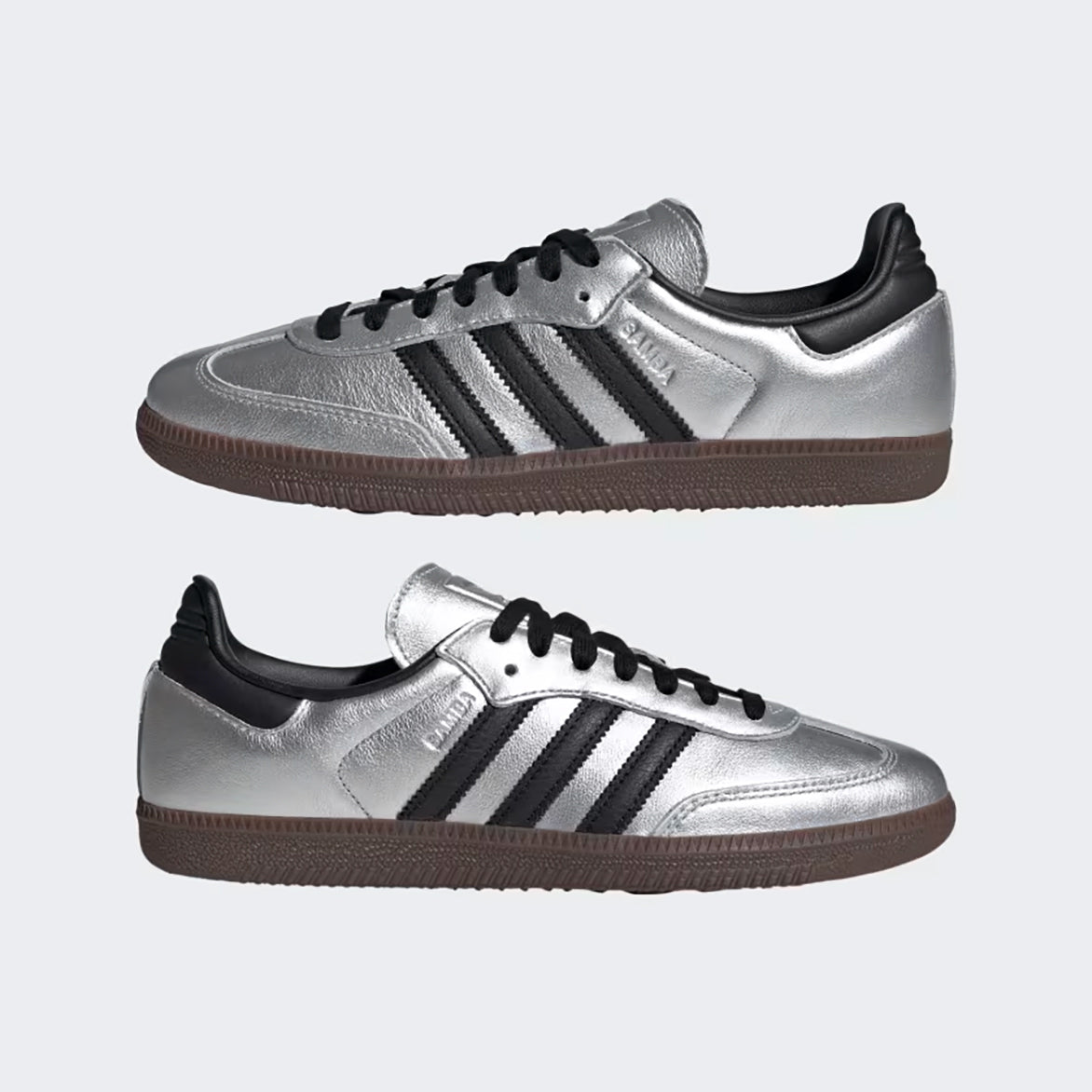 Side profile showing the sleek design of the Adidas Samba OG in silver