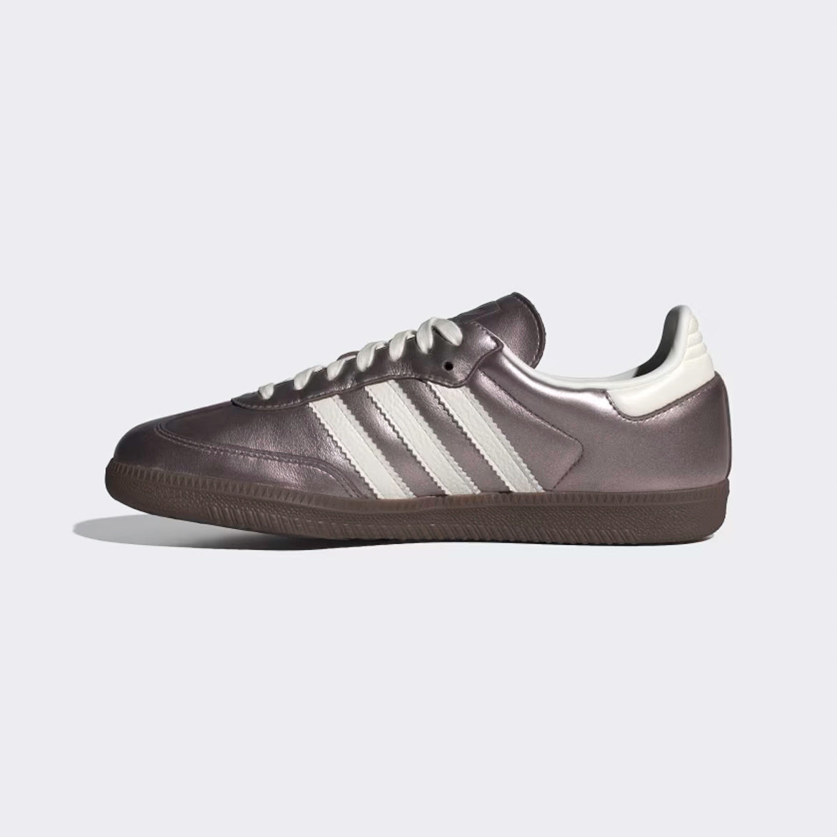 Side view of metallic purple adidas samba OG sneakers with white accents