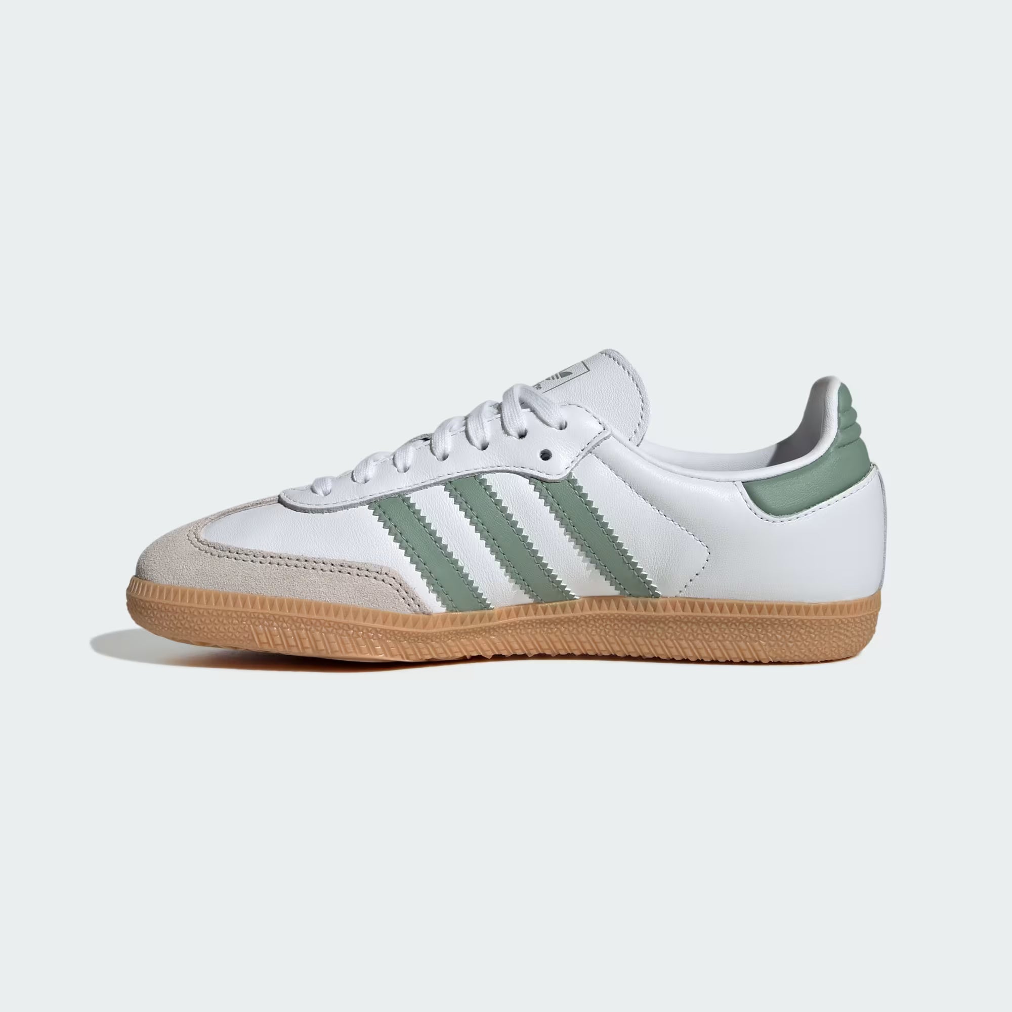 Top view of Adidas Samba kids sneakers highlighting the suede toebox and three stripes.