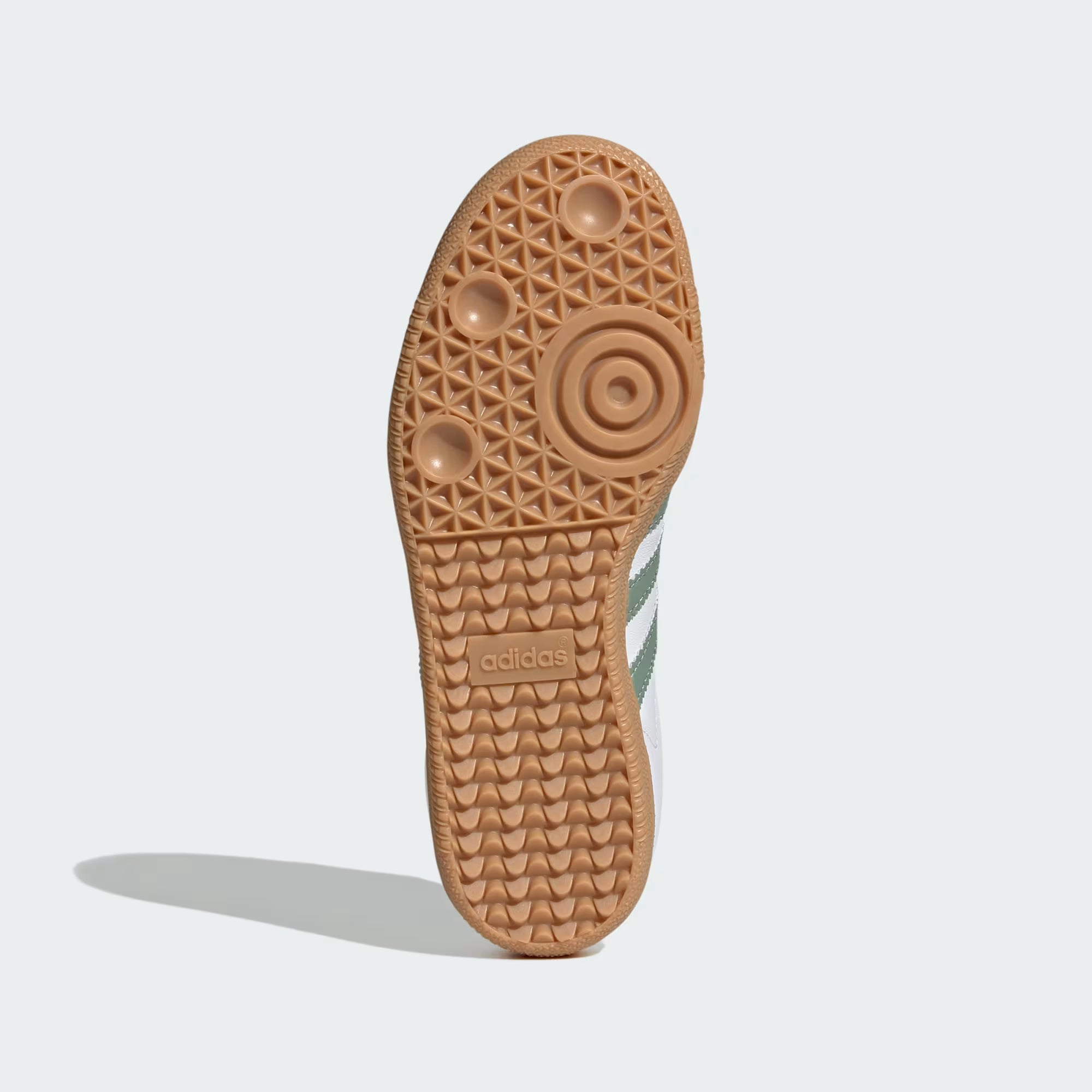 Top view of Adidas Samba kids sneakers highlighting the suede toebox and three stripes.