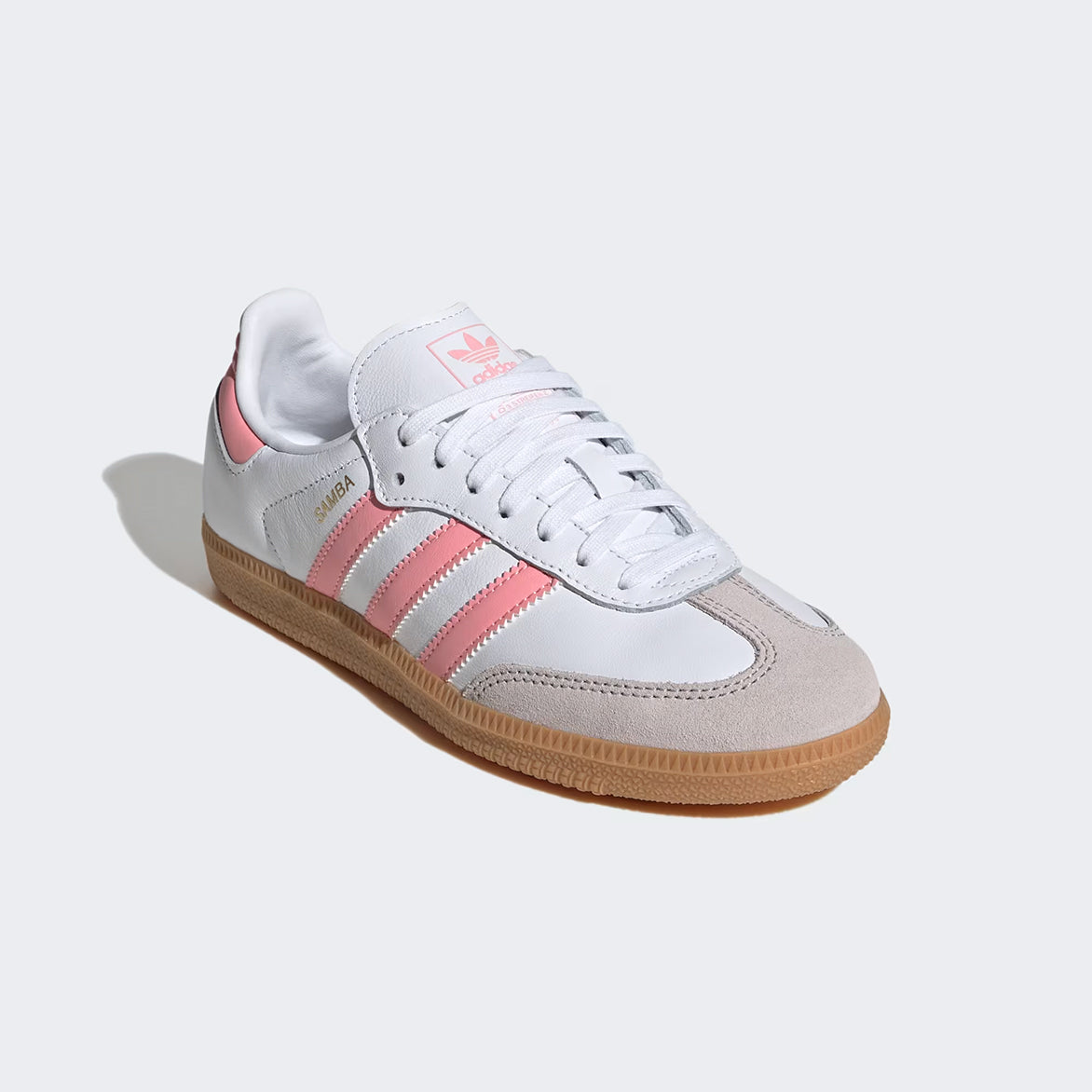 Close-up of the Adidas Samba OG Kids Sneakers highlighting the pink synthetic leather stripes.
