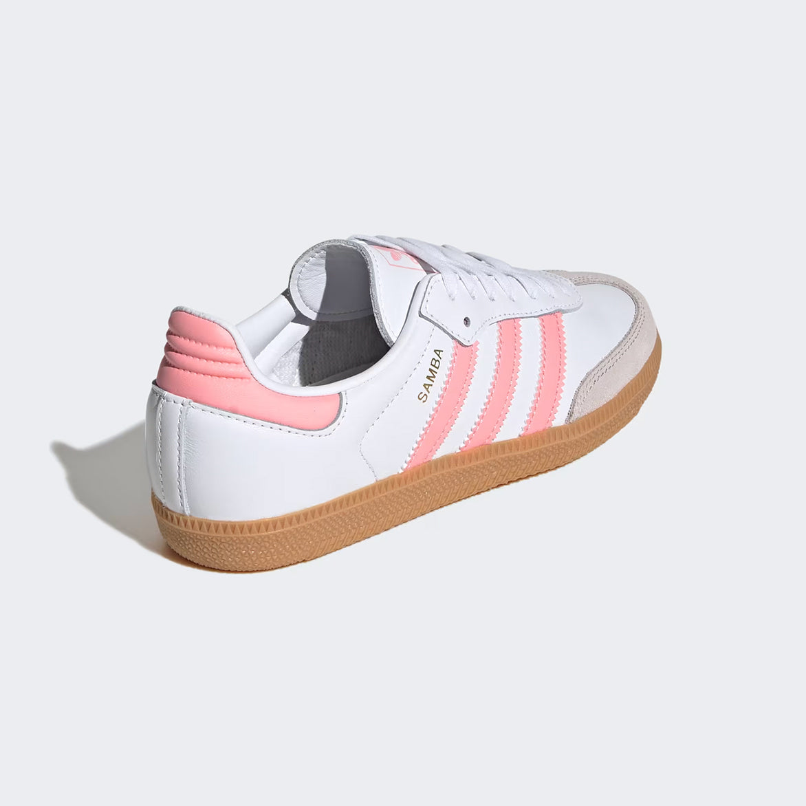 Adidas Samba OG Kids Sneakers on a childs feet, showcasing their versatility for casual outings.