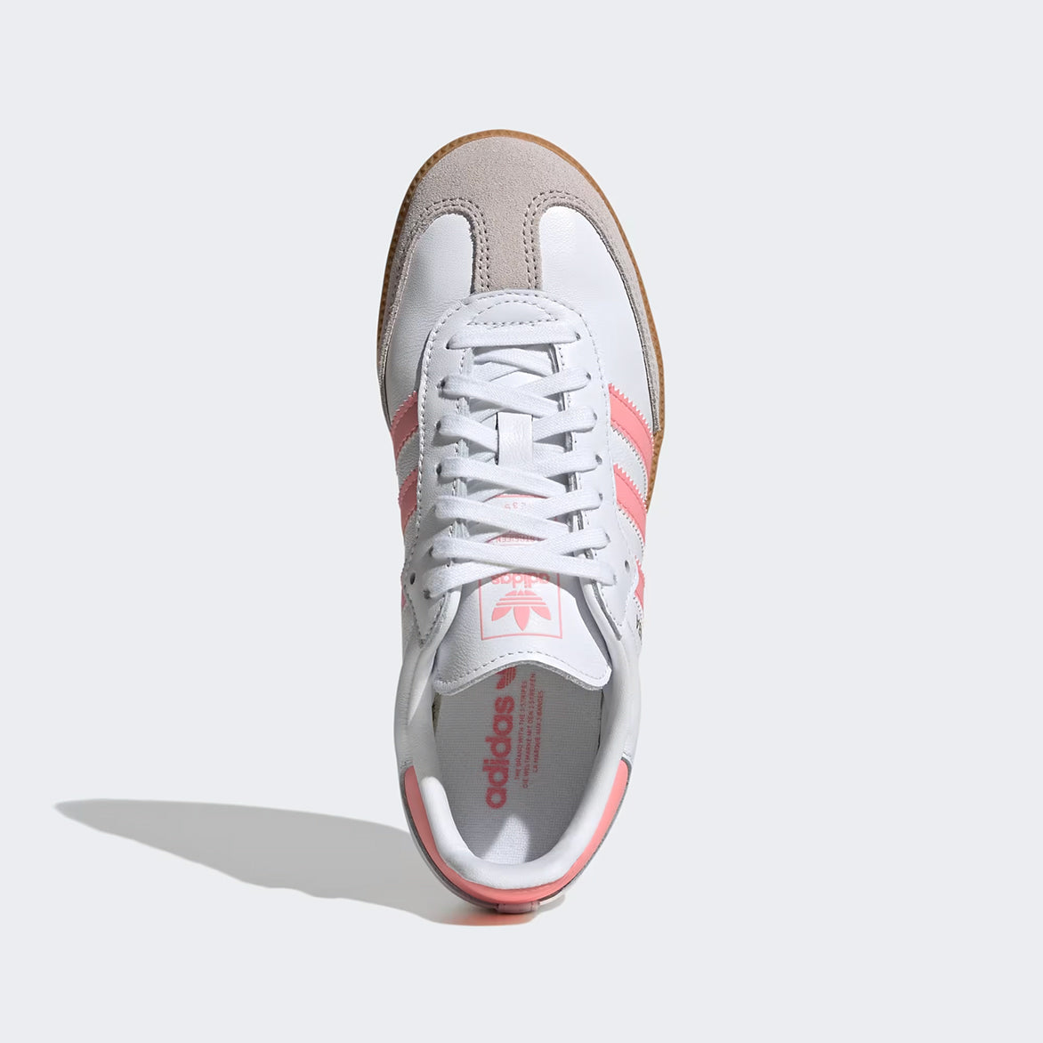 Adidas Samba OG Kids Sneakers showing the Cloud White and Semi Pink colorway from the side.