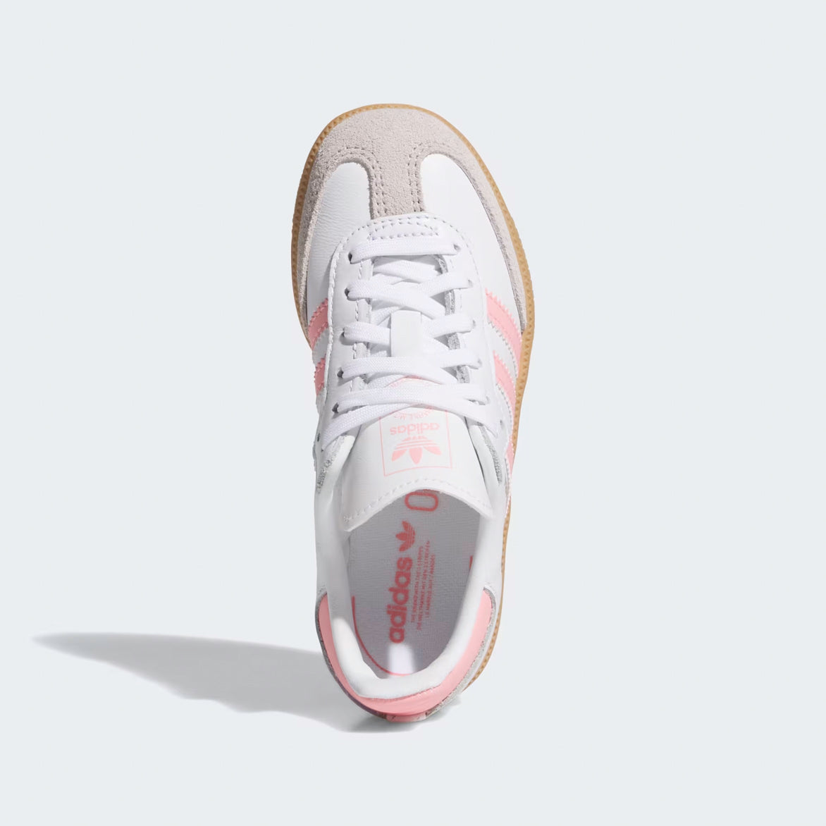 Side view of Adidas Samba OG kids sneakers in white leather with pink accents and gum sole