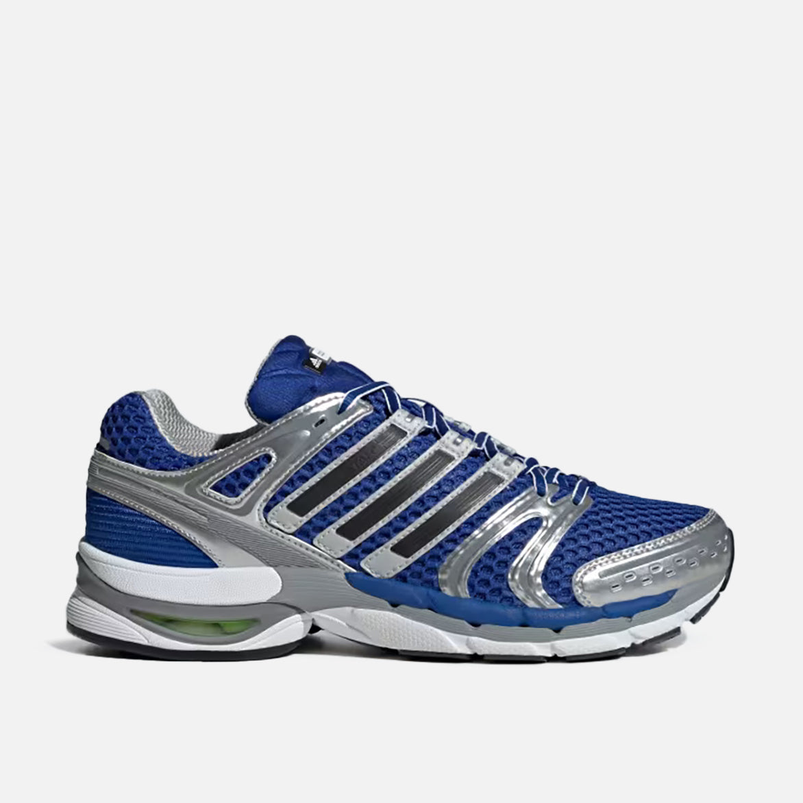 Side view of Adidas Adistar Control 5 sneakers in royal blue and silver metallic, ideal for athletic performance.