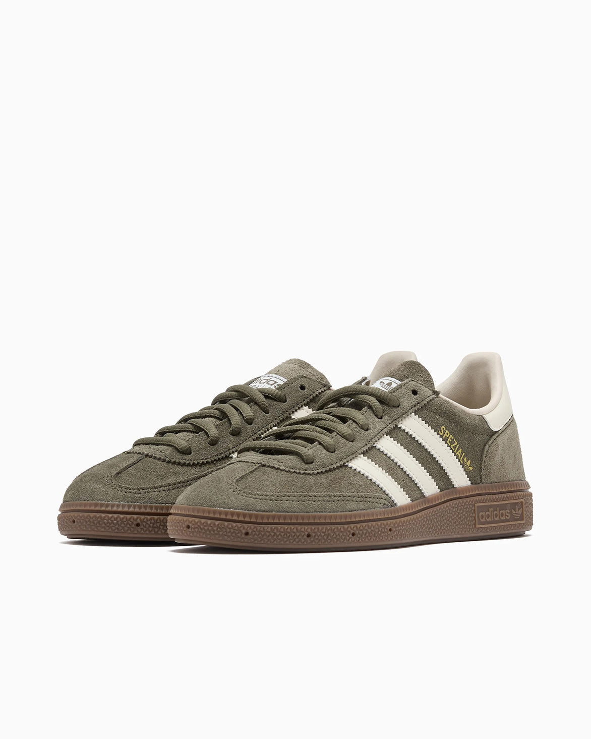 Top angle of limited edition olive green sneakers highlighting the suede and leather materials.