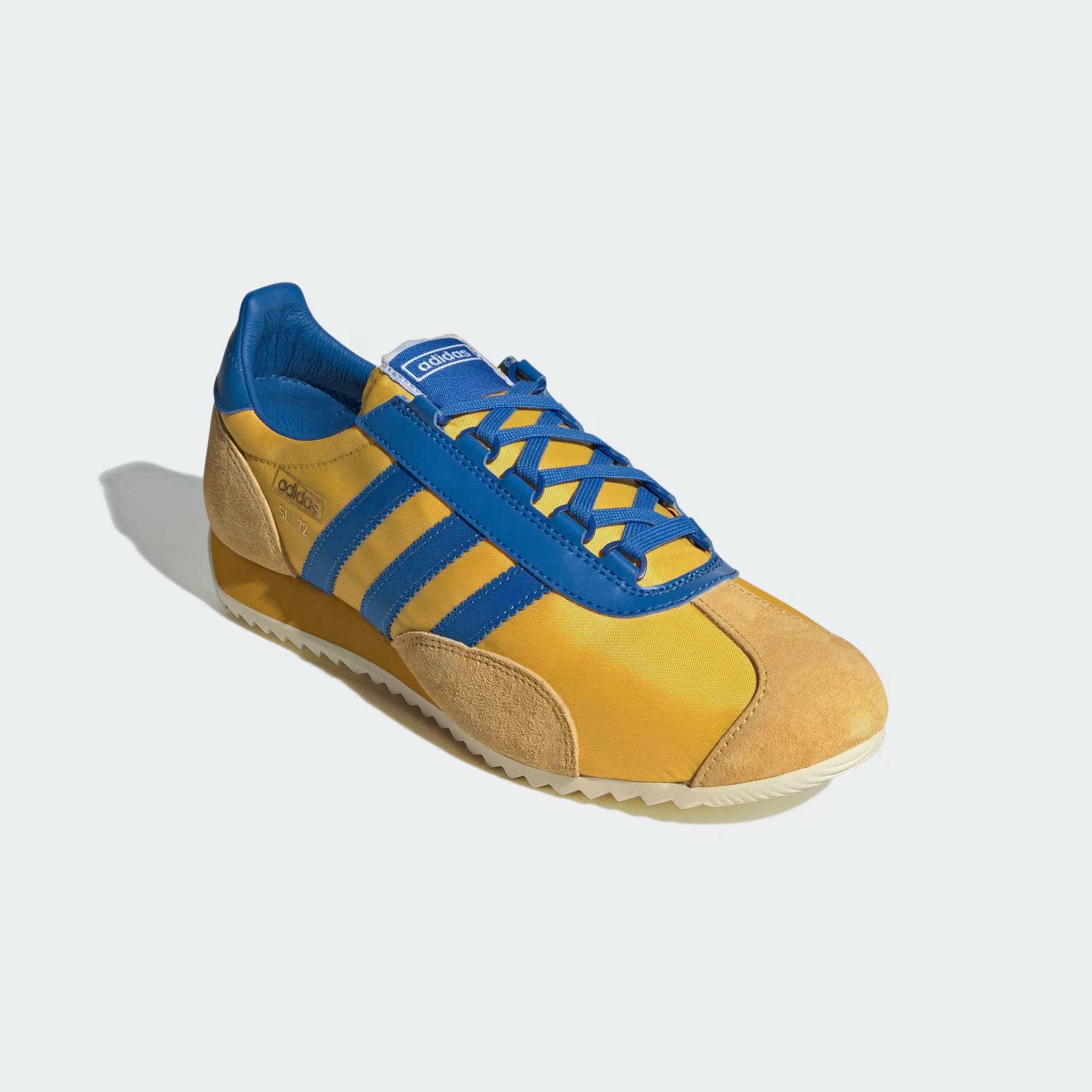 Top view of retro adidas sneakers with detailed stitching and laces