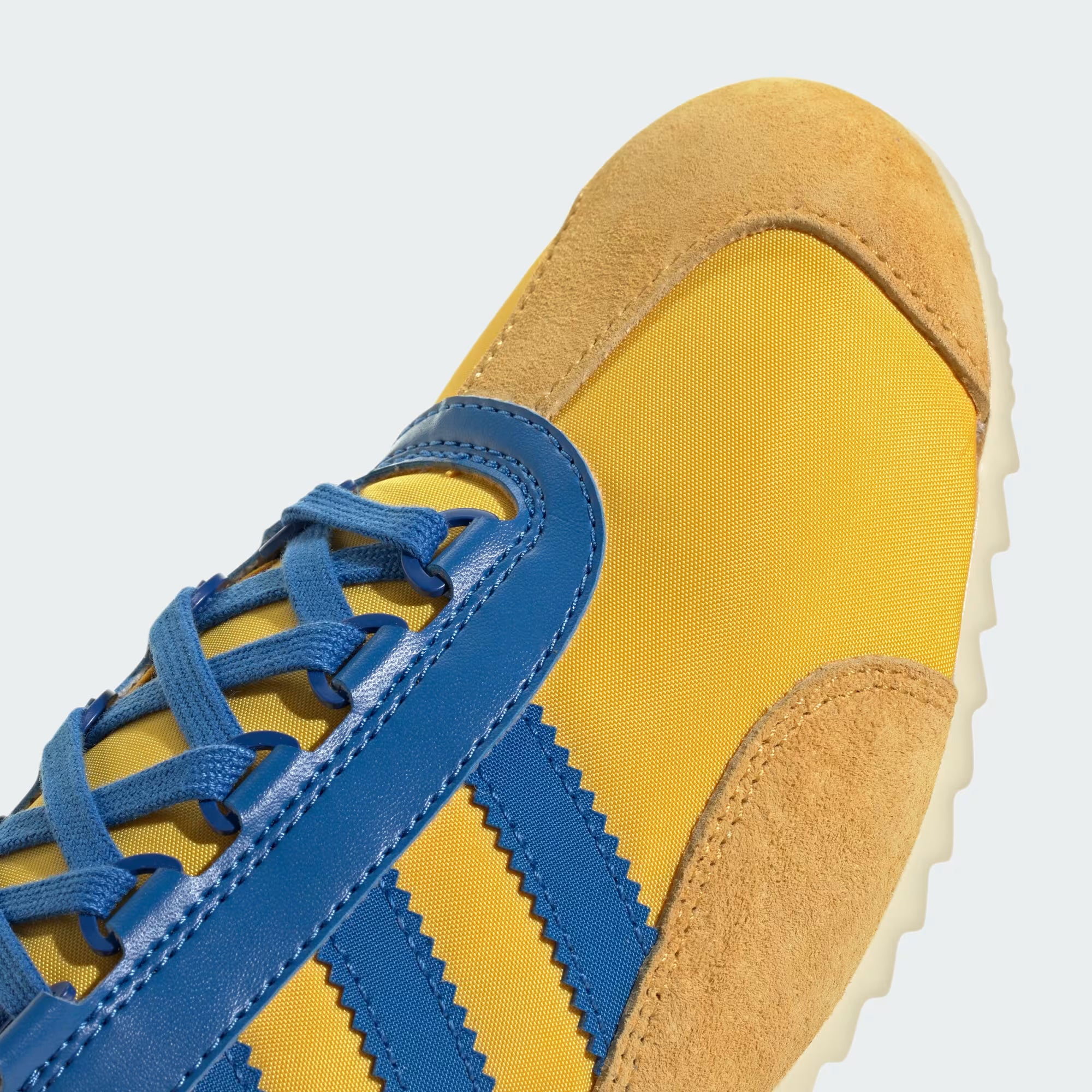 Top view of retro adidas sneakers with detailed stitching and laces