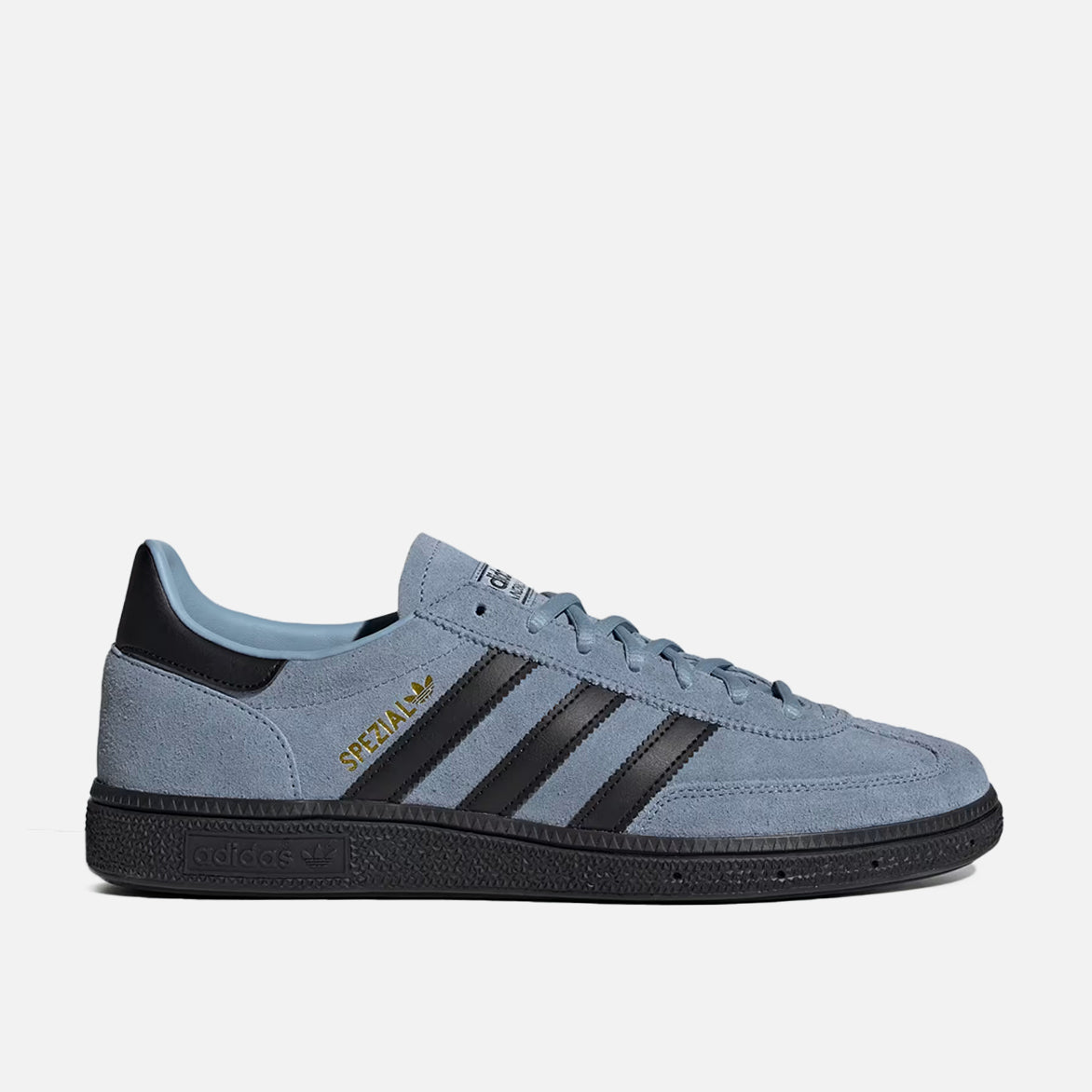 Close-up of blue suede upper on limited edition retro sneakers