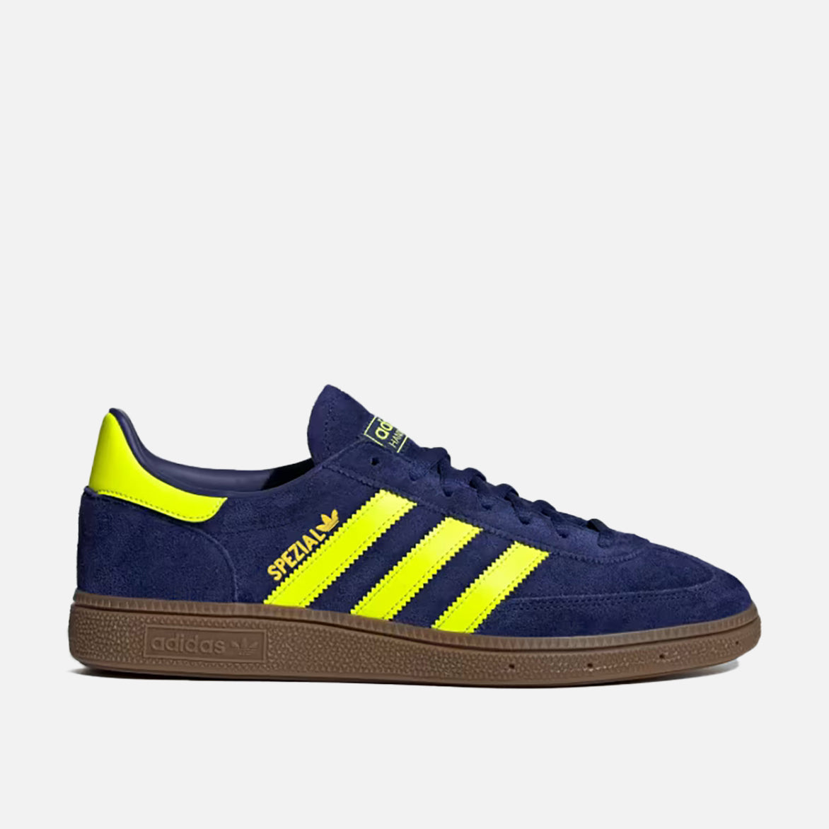 Adidas Handball Spezial side view in Victory Blue and Solar Yellow, highlighting suede and leather details.
