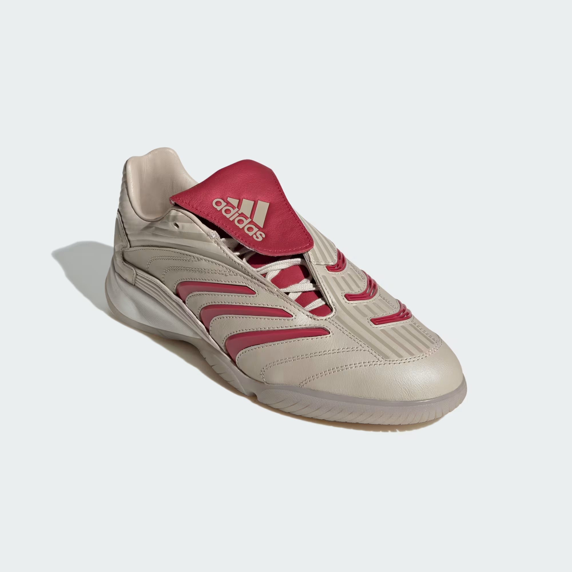Close-up of the Adidas Predator Sala fold-over tongue and 3-Stripes detail, showcasing its stylish design.