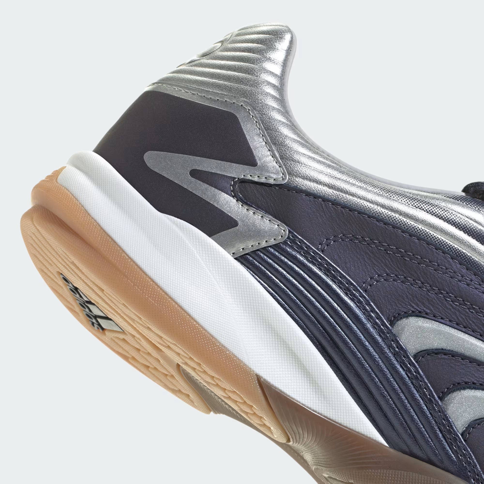 Close-up of the rubber outsole of Adidas Predator Sala sneakers, demonstrating stability and comfort for everyday wear.
