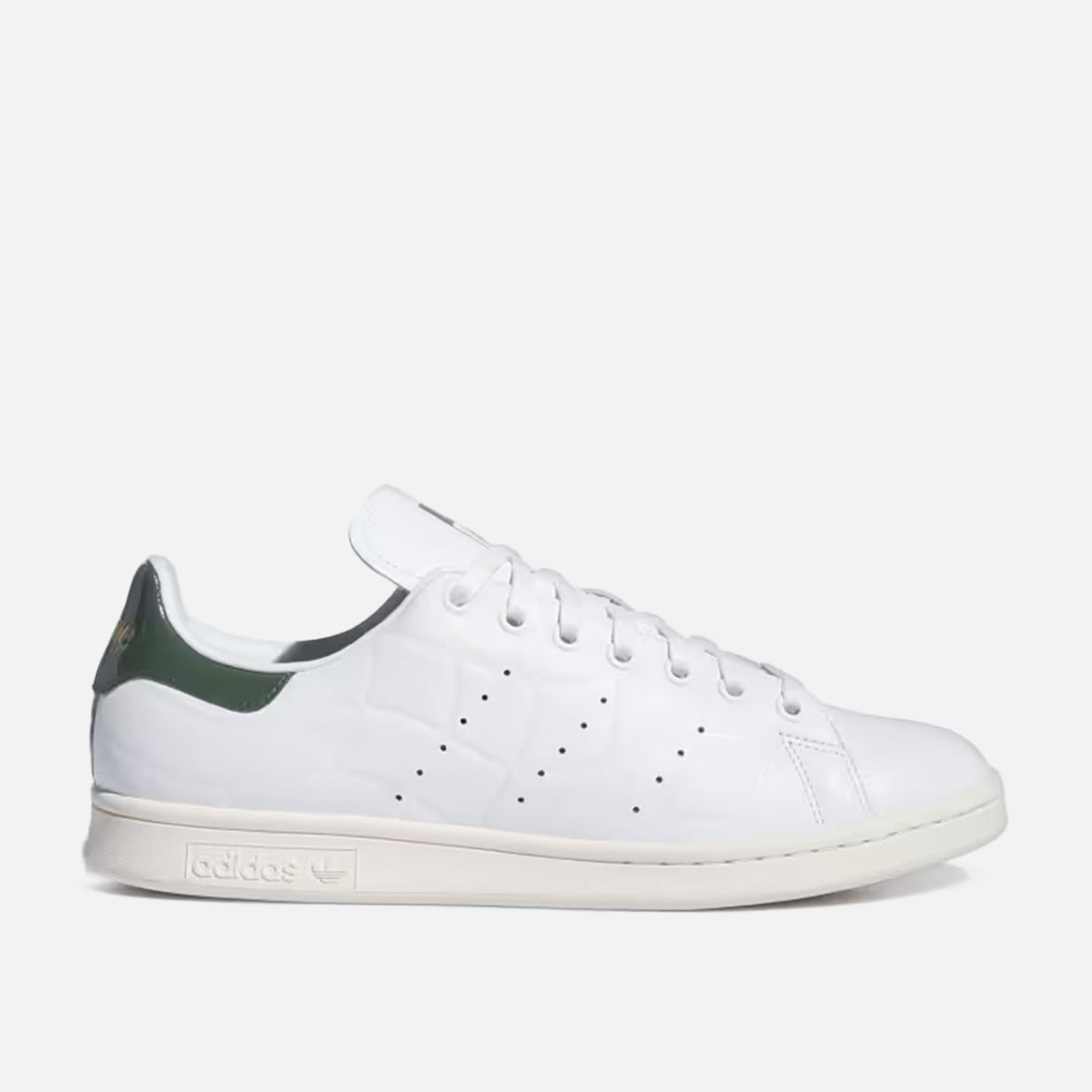 Side view of DIME x Adidas Stan Smith sneakers in Cloud White and Green Oxide