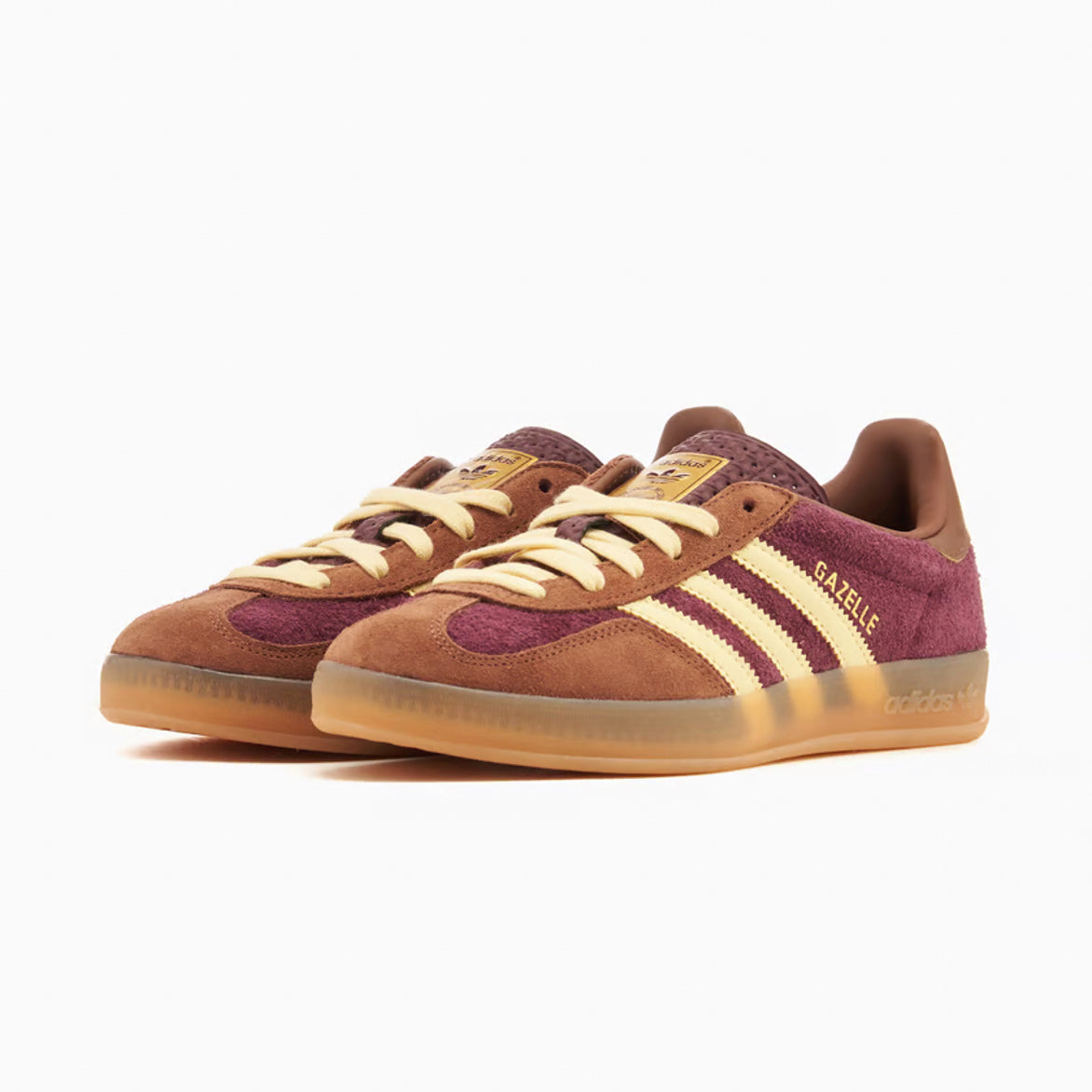 Side profile of casual shoes for men with textured branding and suede overlays