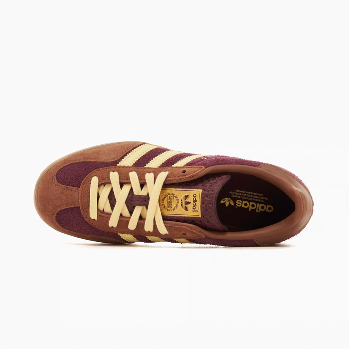Side profile of casual shoes for men with textured branding and suede overlays