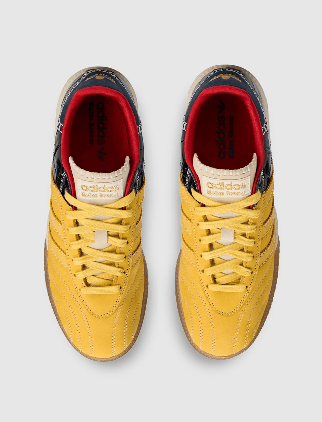 Wales Bonner x adidas Millennium Samba sneakers showcasing the split upper design in gold and navy
