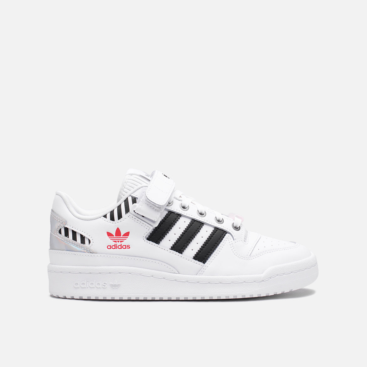 Side view of WMNS Forum Low 'I Love Dance' sneakers highlighting zebra stripe accents.